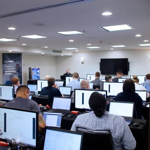 People working on computers in classroom